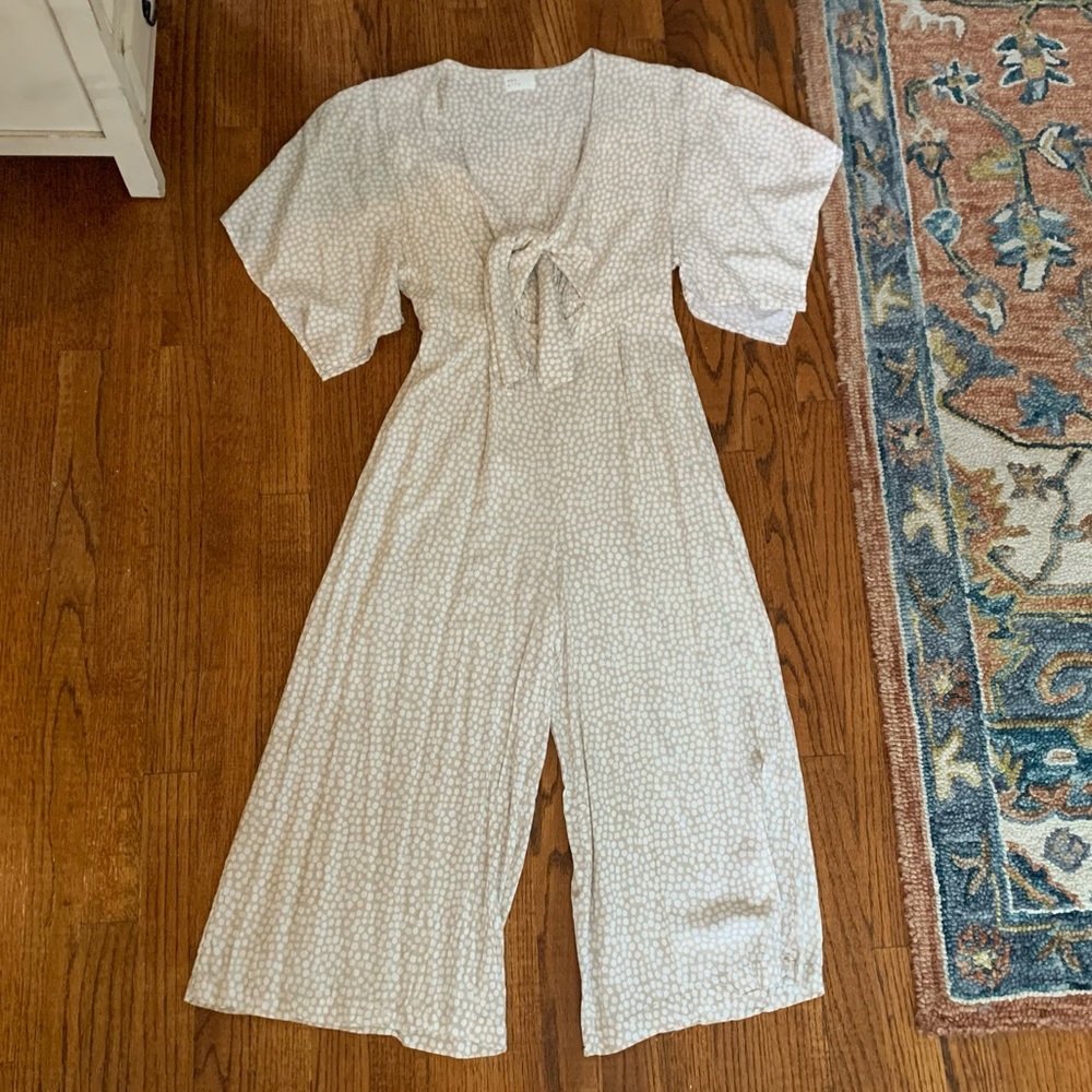 Dee and Lilly jumpsuit . Tan and white.